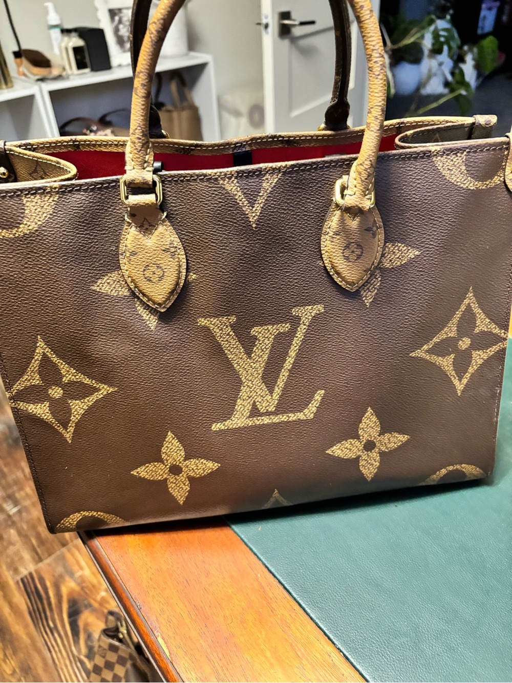 Louis Vuitton On The Go Reverse Monogram MMS with Red Interior Accent